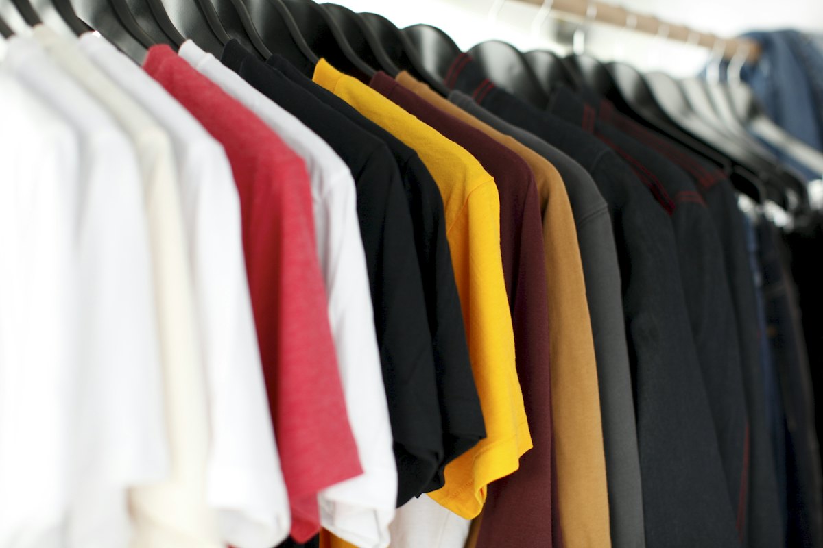 Apparel designers working with sketches and fabric samples